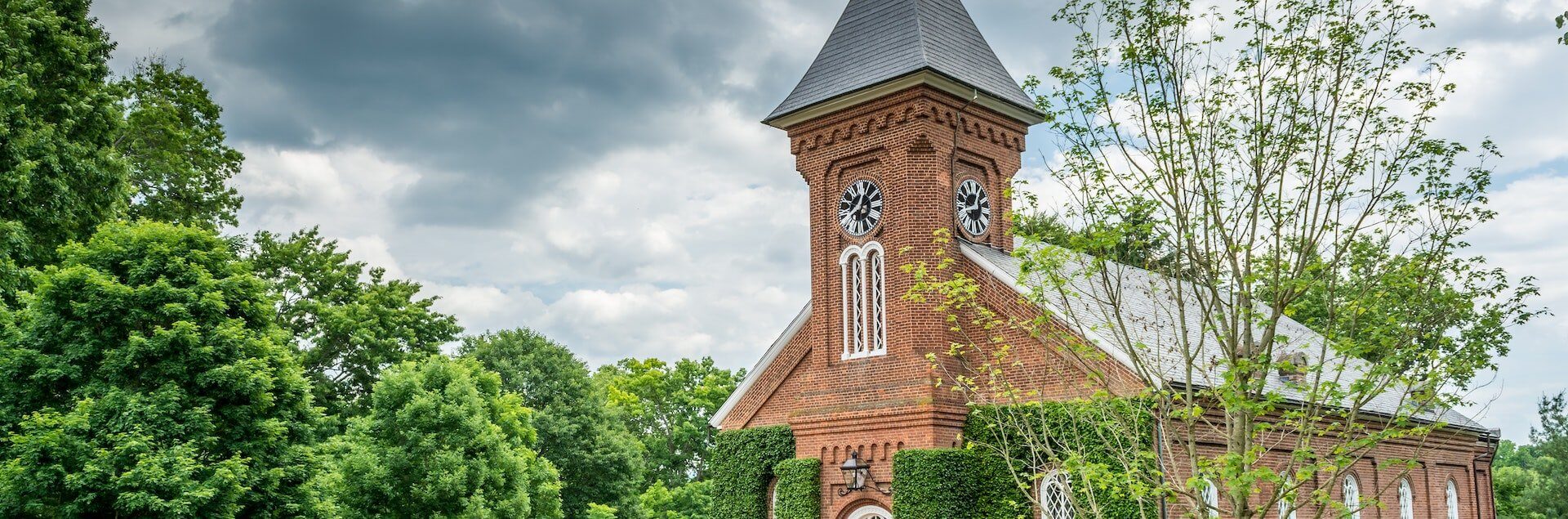 a brick building with a clock tower